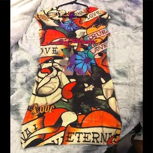 Beautiful, fun, small knit fabric top from Ed Hardy.